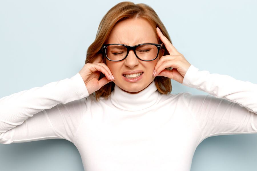 Woman with ringing in her ears after taking this common medication.